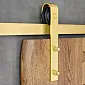 Sliding door system made of steel in golden color, for single-leaf doors up to 100 kg, wall-mounted