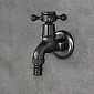 Wall-mounted faucet made of brass, black color, height 11 cm, spout length 2 cm