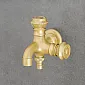 Wall-mounted faucet made of brass, double, brass color, height 12 cm, spout length 12 cm