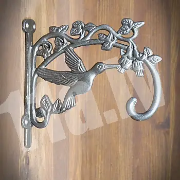 Sieninis laikiklis iš ketaus su paukščiuko formos kabliuku, ilgis nuo sienos 19 cm, rinkinyje 3 vnt.