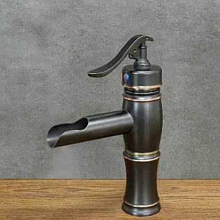 Waterfall style washbasin brass faucet in black color with shabby effect, height 22.5 cm, spout length 10 cm