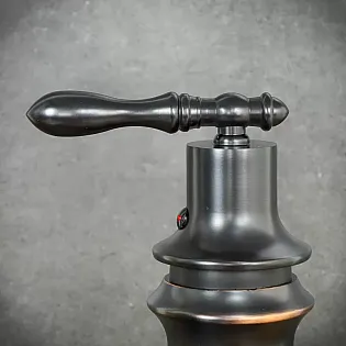 Retro-style sink faucet made of brass in black color, height 33.5 cm, spout length 13 cm