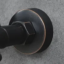 Wall-mounted faucet made of brass, black color, with the spout raised at an angle of 115 degrees, height 19 cm