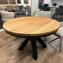 Round extendable dining table with solid wood top and black legs, diameter 100 cm or 120 cm, maximal length 176 cm or 196 cm
